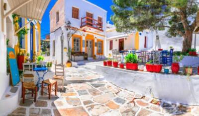 Wandbild: Schönes traditionelles griechisches Dorf Lefkes auf der Insel [...]