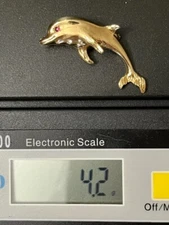 Solid 14k happy dolphin pin or brooch- ruby eye-close to  gold melt/scrap price