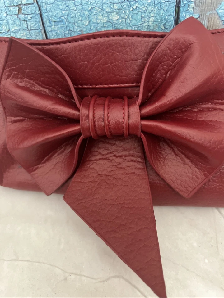 Bolso sin asas con lazo rojo Cartera PVC Muñequera Cremallera Múltiples bolsillos Arco grande Foto 2 de 4