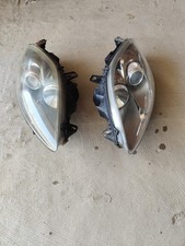 Coppia fari fanali anteriori Fiat Bravo Croma 2009