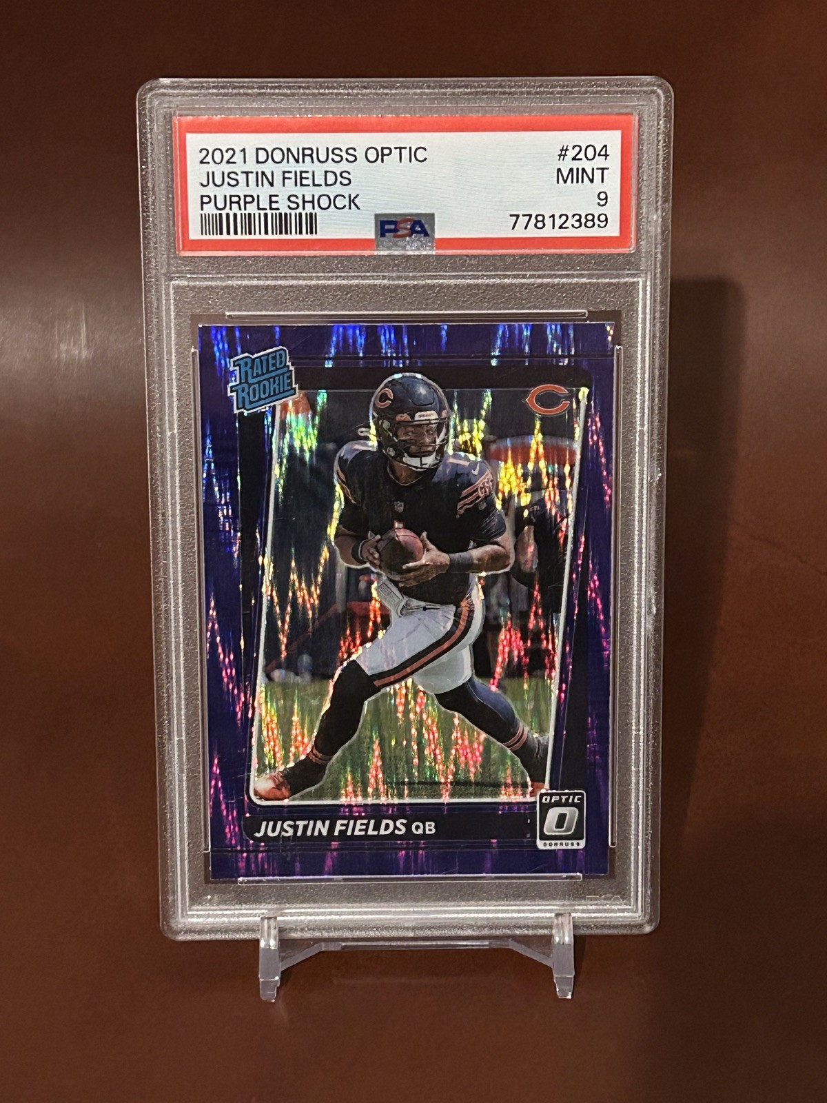 Justin Fields 2021 Donruss Optic Purple Shock Prizm Rated Rookie #204 PSA 9