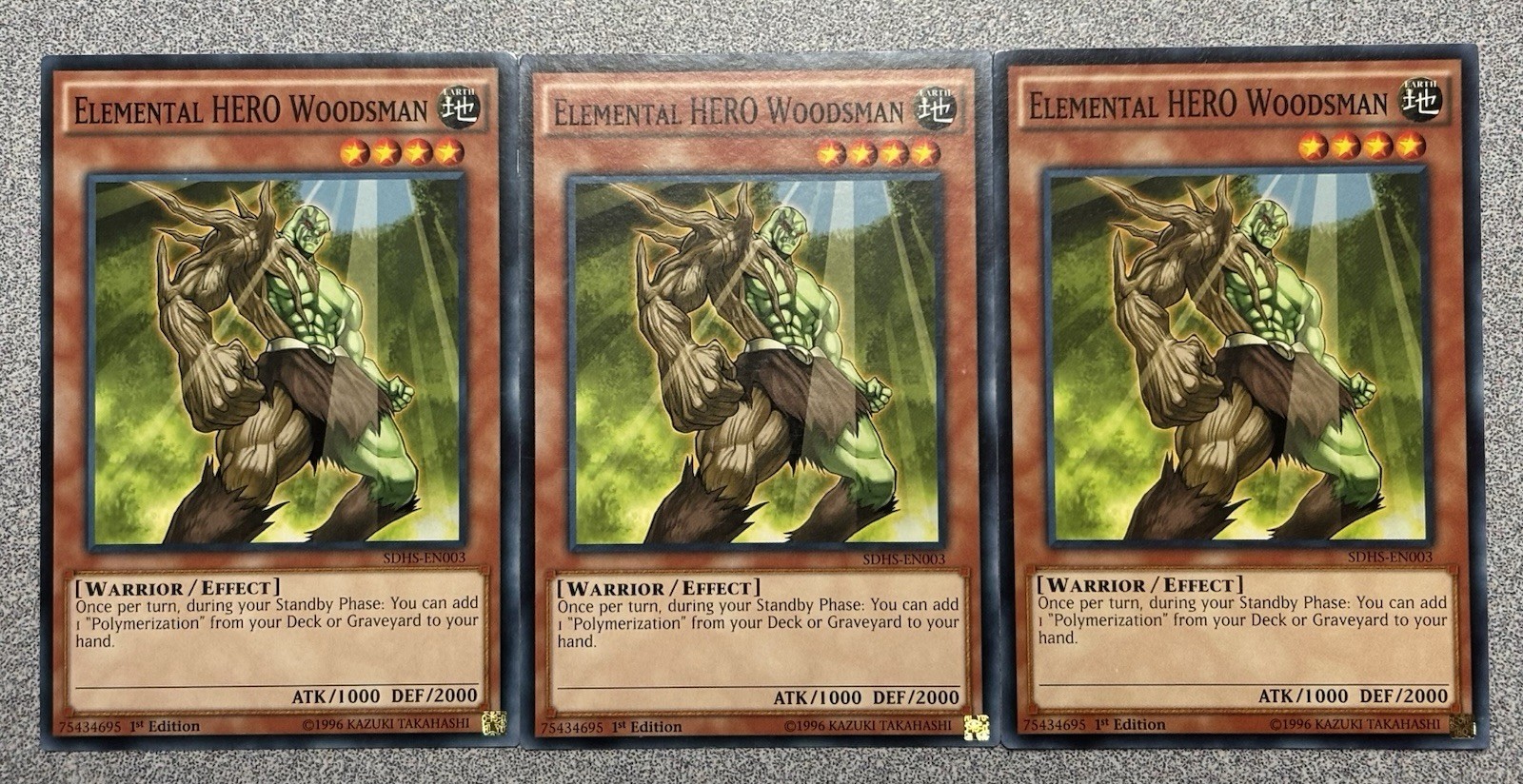 Elemental HERO Woodsman SDHS-EN003 Structure Deck: HERO Strike 1st Edition