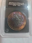 1886 Morgan Silver Dollar (AU) 100% Rainbow Toned Brilliant Uncirculated Cond