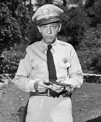 Don Knotts as Barney Fife loading his gun Andy Griffith Show 8