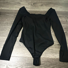 Women  s Black Long Sleeve One-Piece Bodysuit Size M Regular Solid Opaque