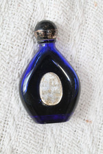 VINTAGE COLBALT BLUE PERFUME BOTTLE BOURJOIS EVENING IN PARIS OVER HALF FULL