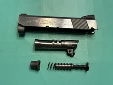 USED OEM COLT DEFENDER LIGHTWEIGHT SERIES 90 STAINLESS SLIDE BARREL SPRING .45