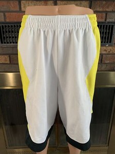 black and yellow jordan shorts