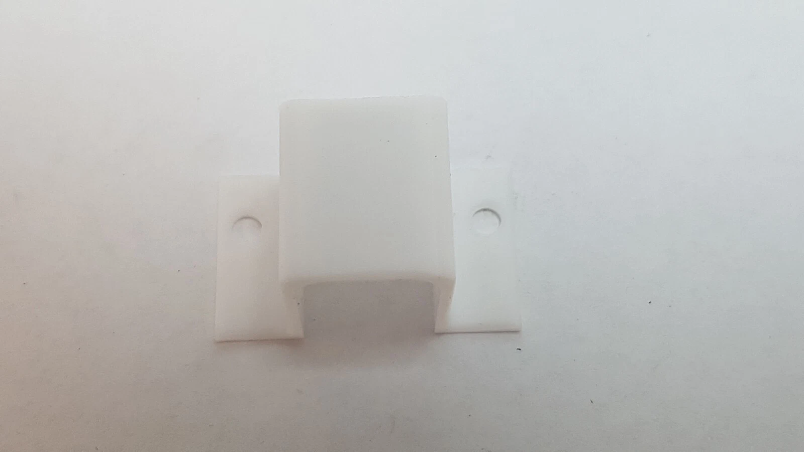White MM3736060 cover at an angle with mounting holes in both flanges