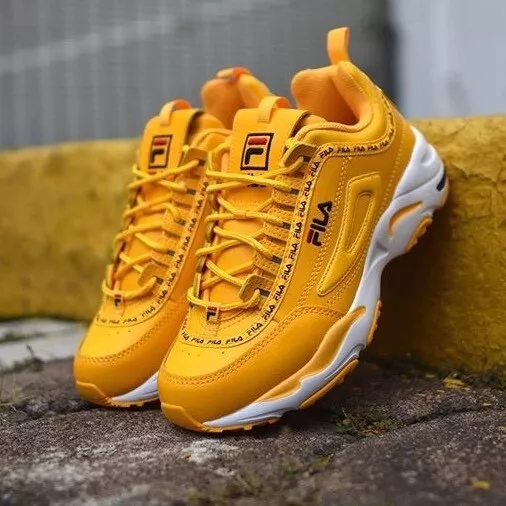 Fila white store with gold