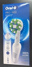 Oral-B Pro 1000 Rechargeable Electric Toothbrush And Charger Base White 9636