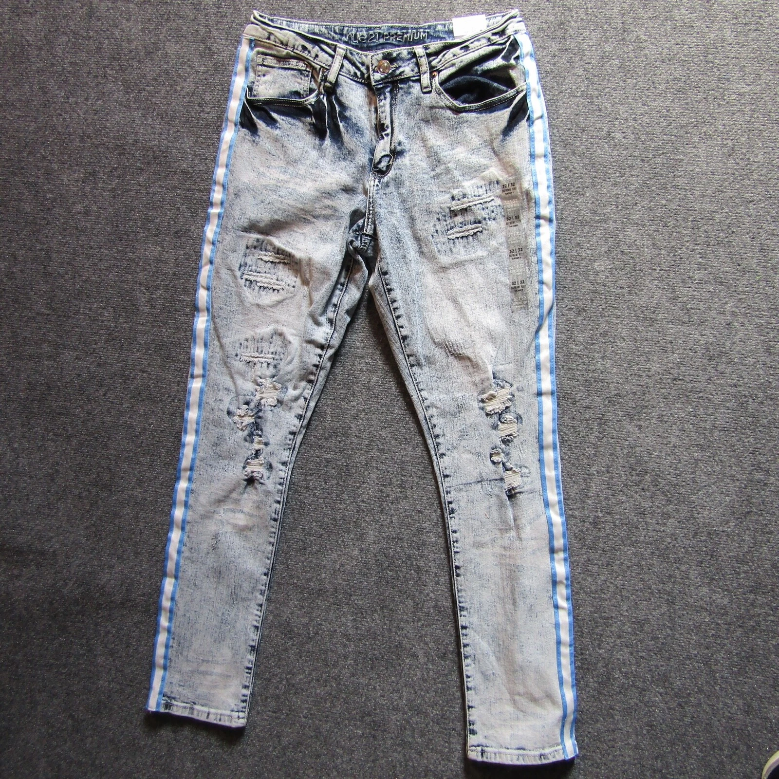 Jean maigre Rue 21 Premium Supreme Flex moyen lavé déchiré bande bleue réparée