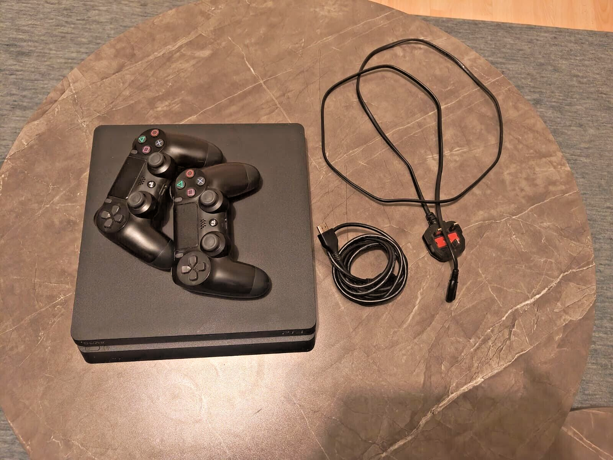 Sony PlayStation 4 Slim 1TB Console - Jet Black + 2 x Dualshock 4