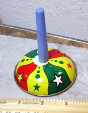 Vintage metal noise maker, colorful graphics, plastic handle, 3 x 3.25 inches