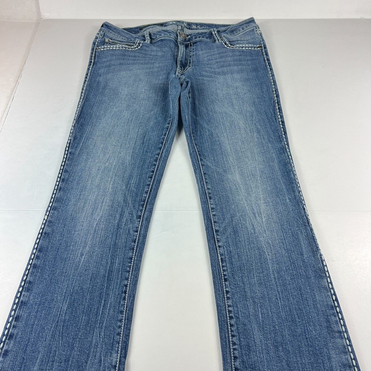 Wrangler Rock 47 Jean Junior Low Rise Bootcut Blue Faded Whisker Stretch  Denim