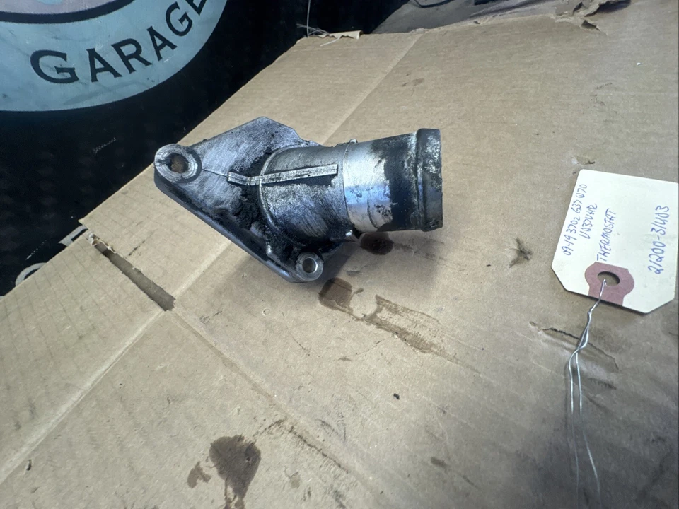 09-19 Nissan 370z Infiniti G37 Q70 Motor Termostato y Carcasa 21200-31U03 Foto 4 de 4