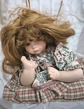 Vintage-style collectible porcelain doll, Resting on  a pillow👍👍👍