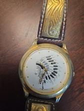 INDIAN CHEIF ,LEATHER AND BRASS WESTERN WRIST WATCH.WORKS.