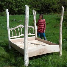 Handcrafted Rustic Four-Poster Bed – Unique Wooden Bed Frame with Natural Branch