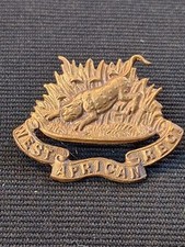 WEST AFRICA REGIMENT THEATRE MADE CAST CAP BADGE ON LUGS