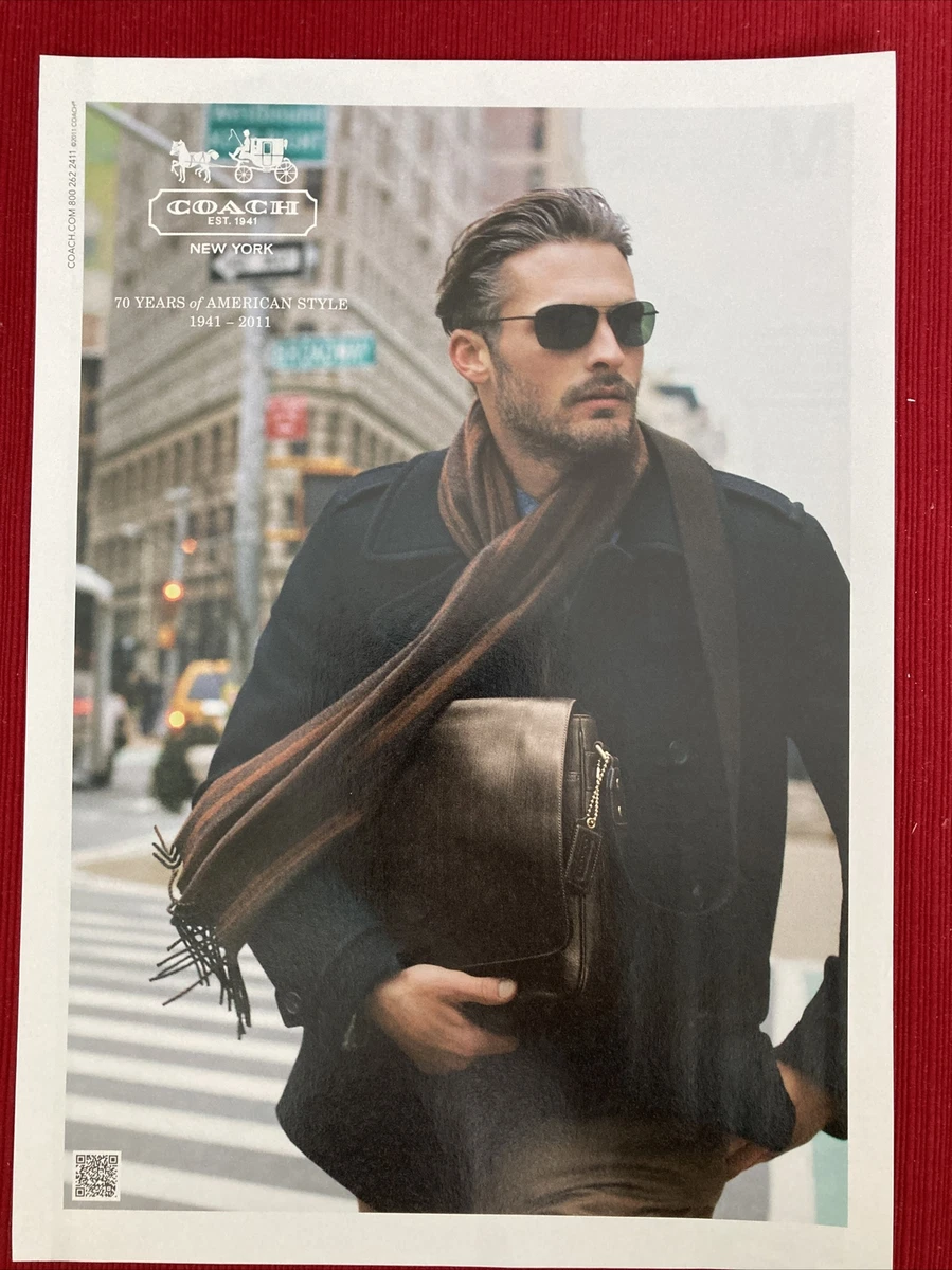 poster advertising Louis Vuitton handbag in paper magazine from