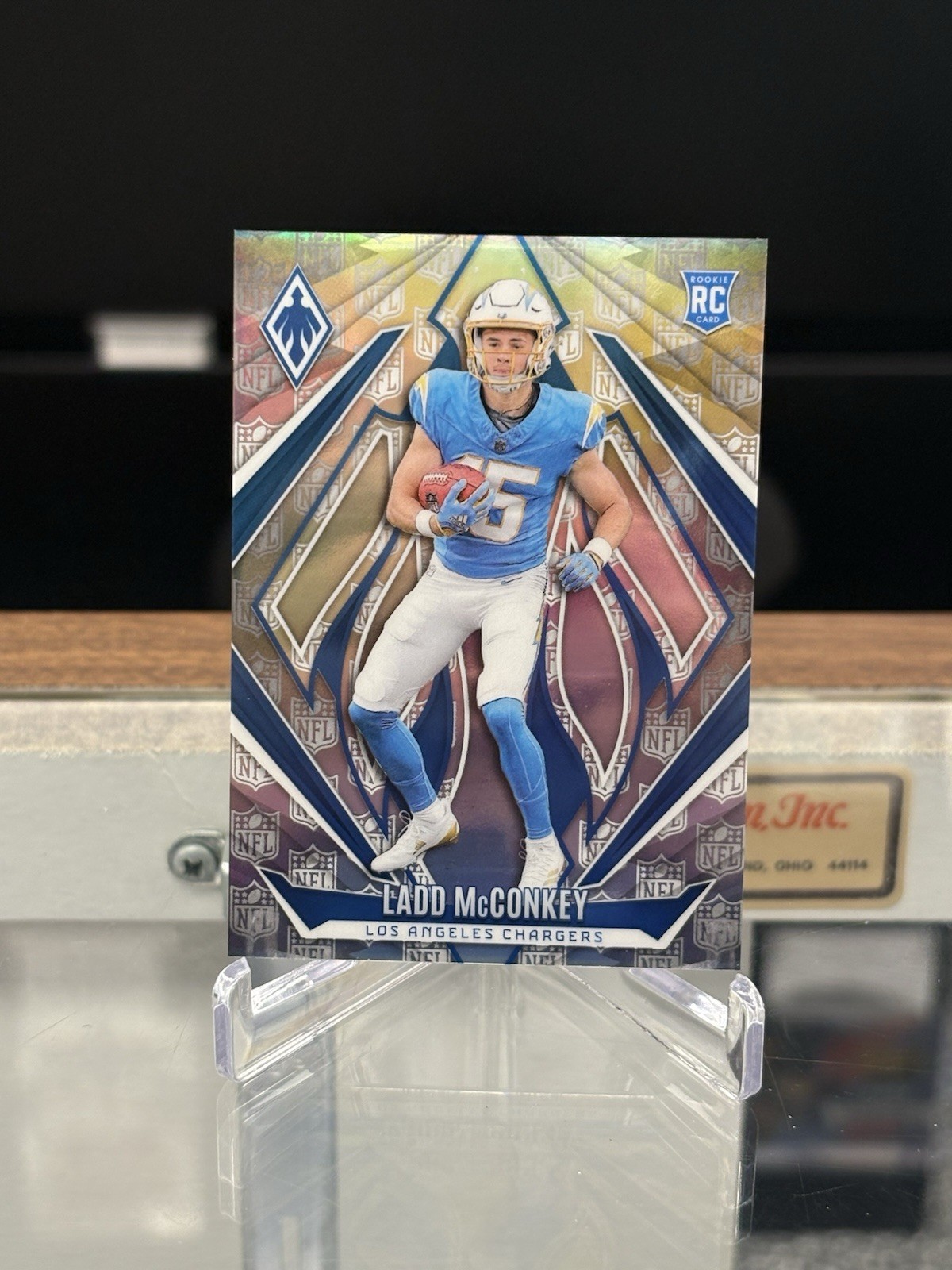 2024 Panini Phoenix Football #216 Ladd McConkey NFL Shield 74/150 Rookie (JR)