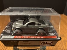 Auto World SUPER lll 3 2005 Ford Mustang GT Gray Slot Car NEW In Cube