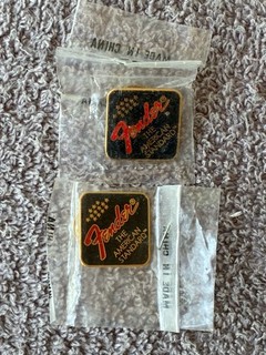 TWO (2) VINTAGE FENDER GUITARS LOGO/EMBLEM LAPEL PINS NEW IN ORIGINAL PKGS.