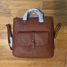 Brown Backpack with Buckle Accent, Adjustable Strap, Front Pocket, Top Handle