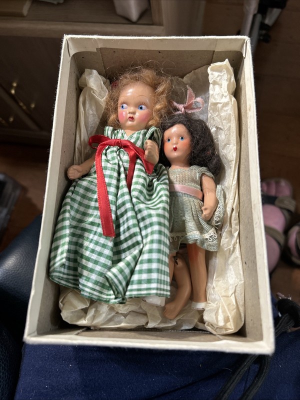 Two Vintage 1940’s Era Tiny Dolls In Poll Parrot Shoe Box Bottom