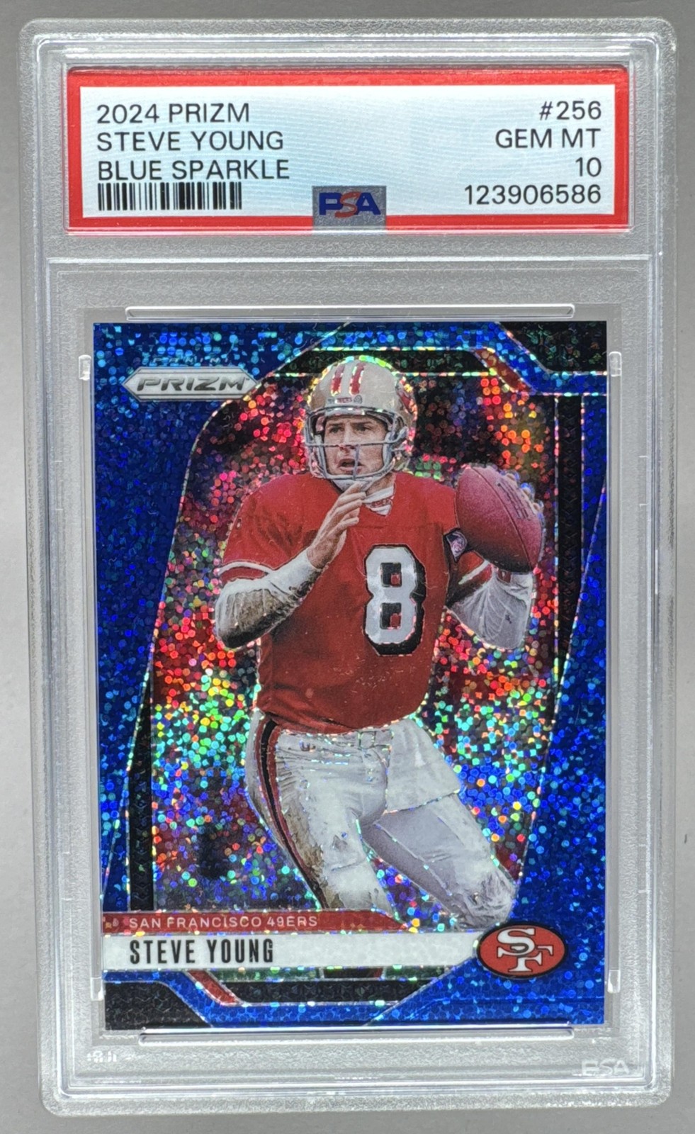 123906586 Steve Young 2024 Panini Prizm #256 Blue Sparkle /96 PSA 10