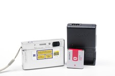Sony Cyber-Shot DSC-T100 8.1MP 5x Digital Compact Camera + Battery & Charger