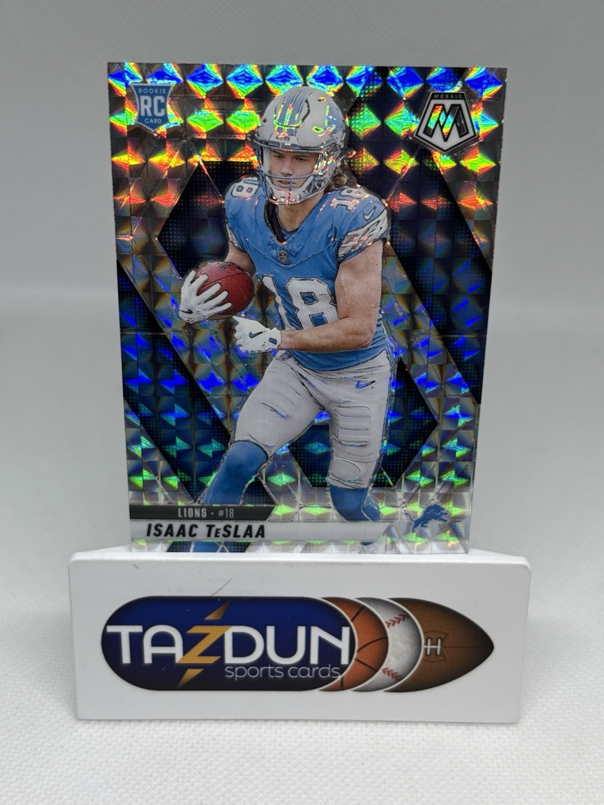 2025 Panini Mosaic Isaac Teslaa Rookie Silver Mosaic Prizm #319 Detroit Lions
