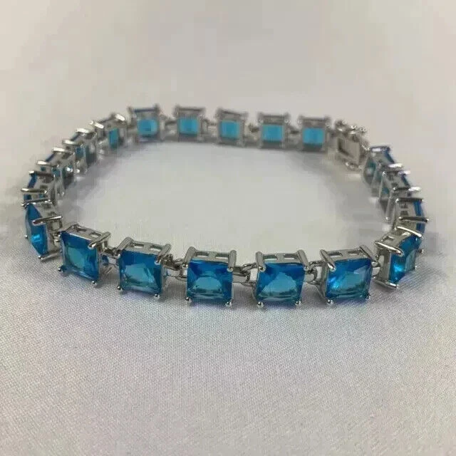 Brazalete Tenis Topacio Azul 14Ct Corte Princesa Creado en Laboratorio Chapado en Oro Blanco 14K Foto 3 de 4