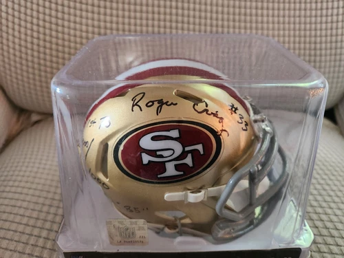 Roger Craig signed mini helmet with inscription