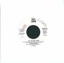 DISCO 45 GIRI          FRANK SINATRA / PRINCE – L.A. IS MY LADY / WHEN DOVES CRY