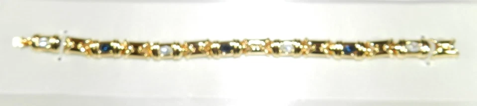 Nuevo - Pulsera Nolan Miller Tono Dorado con Cristales Transparentes + Azules - 7.75" Largo Foto 3 de 4