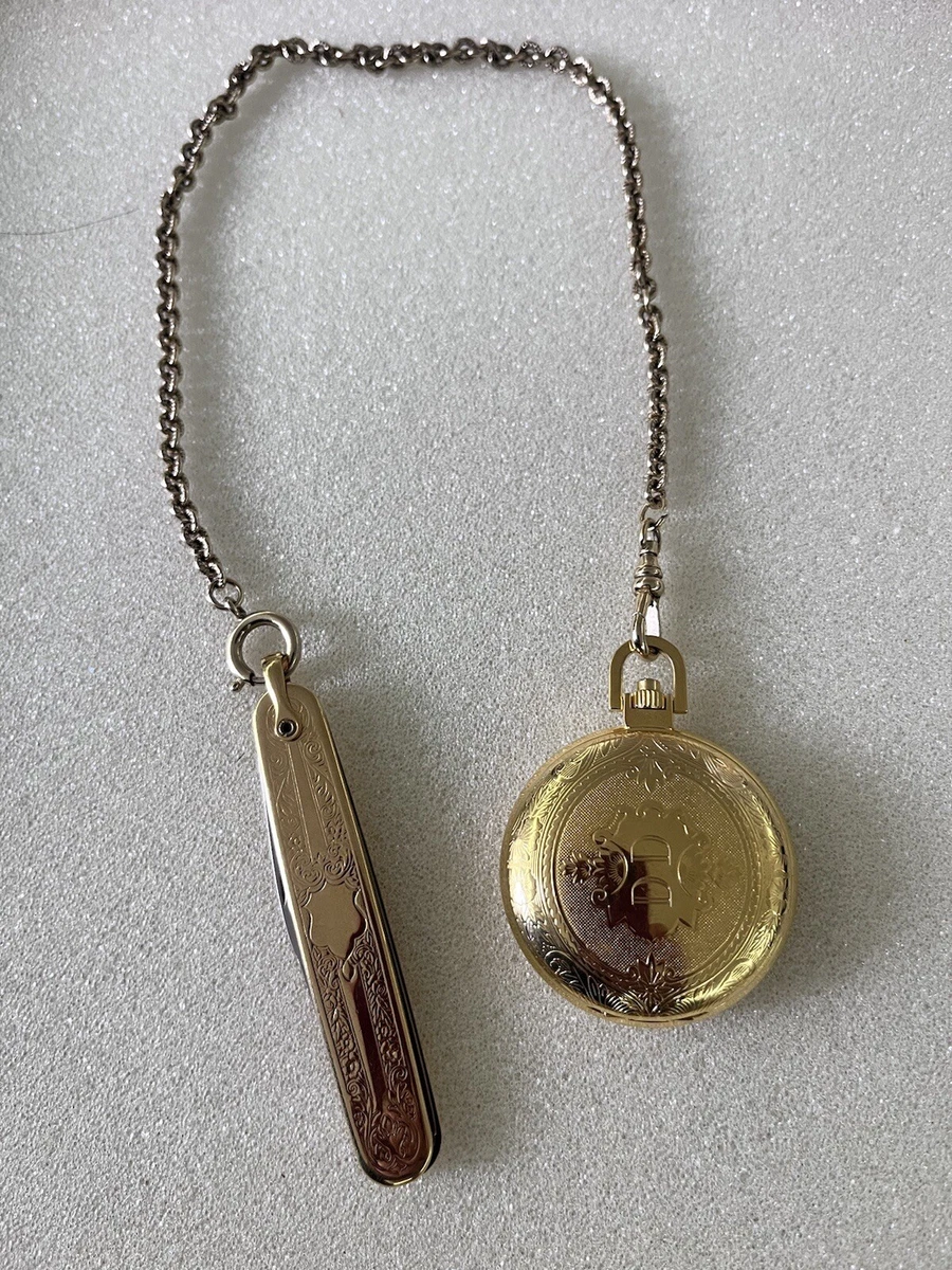 Colibri pocket watch with cheap knife