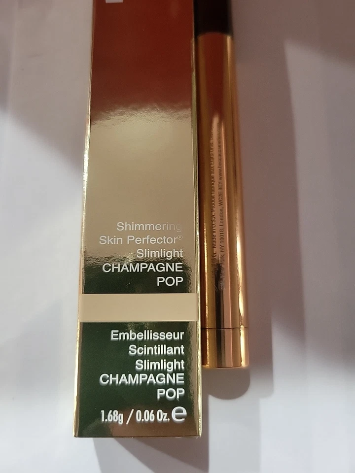 Iluminador BECCA Jaclyn Hill Shimmering Skin Perfector Slimlight - Champagne Pop Foto 3 de 4