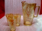 VINTAGE 50'S JEANETTE CARNIVAL GLASS PITCHER WITH GLASSES  MARIGOLD COSMO DESIGN