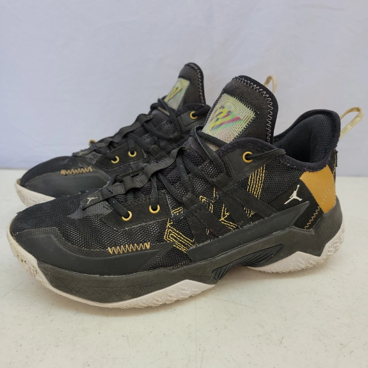 Black and gold top jordan basketball shoes