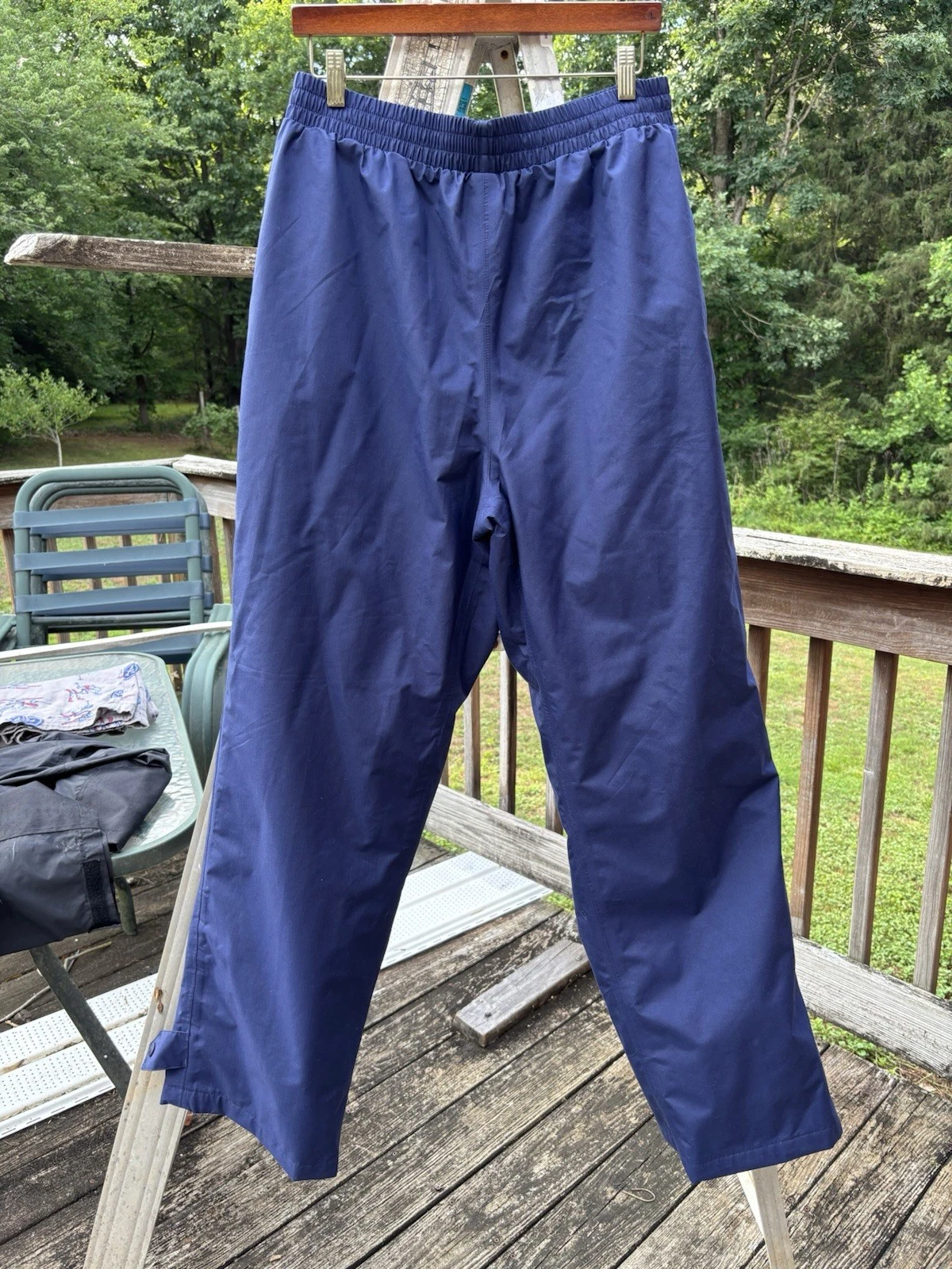 Vintage Cabela's Gore-Tex navy blue rain pants with an elastic waist.
