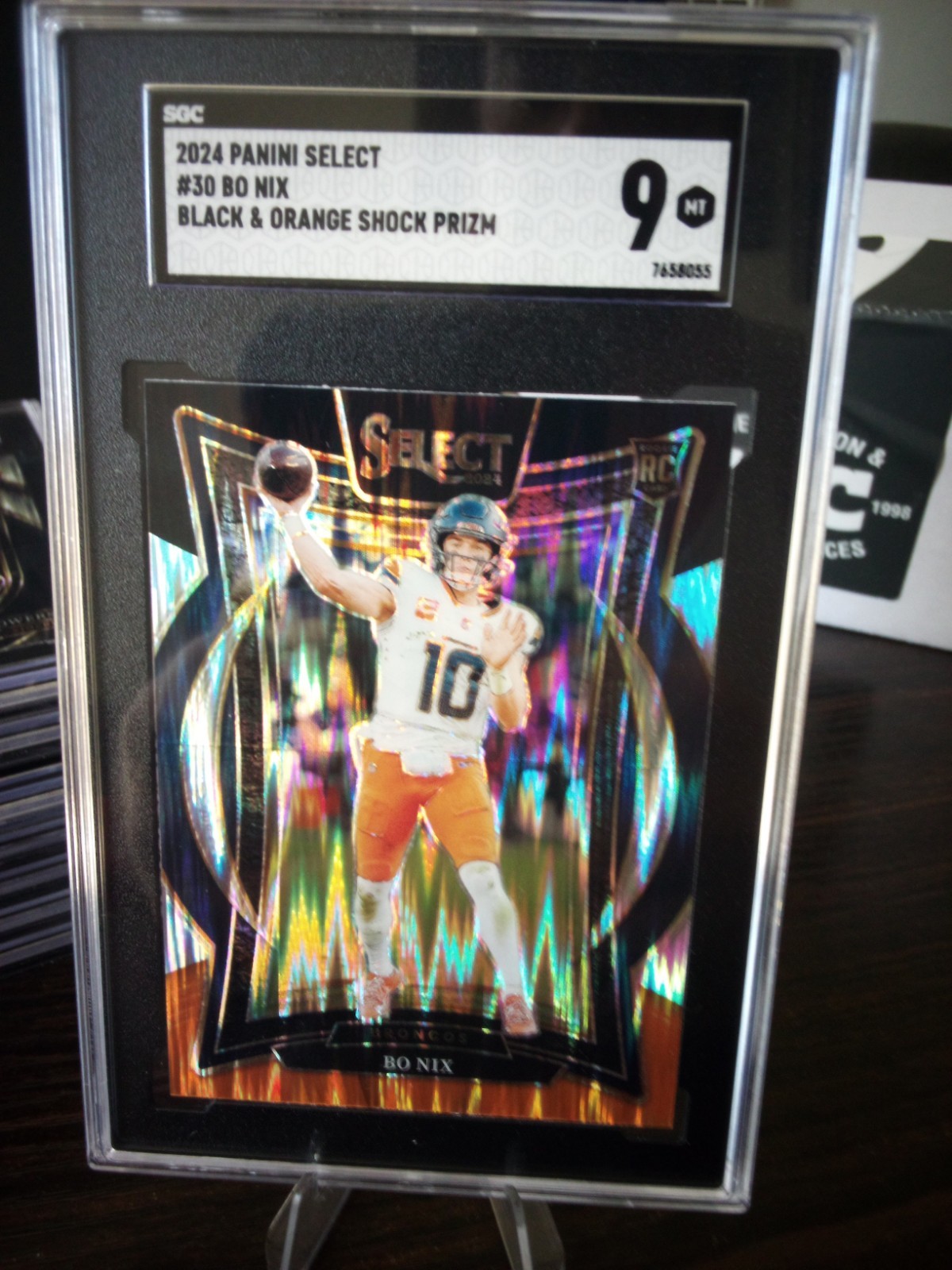 2024 Panini Select - Concourse Bo Nix #30 Black & Orange Shock Prizm (RC)