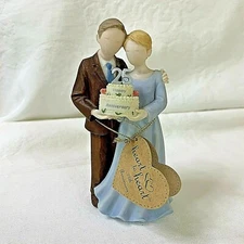 ABOUT FACE DESIGNS~2008 25 anniversary "Heart to Heart" figurine 130463