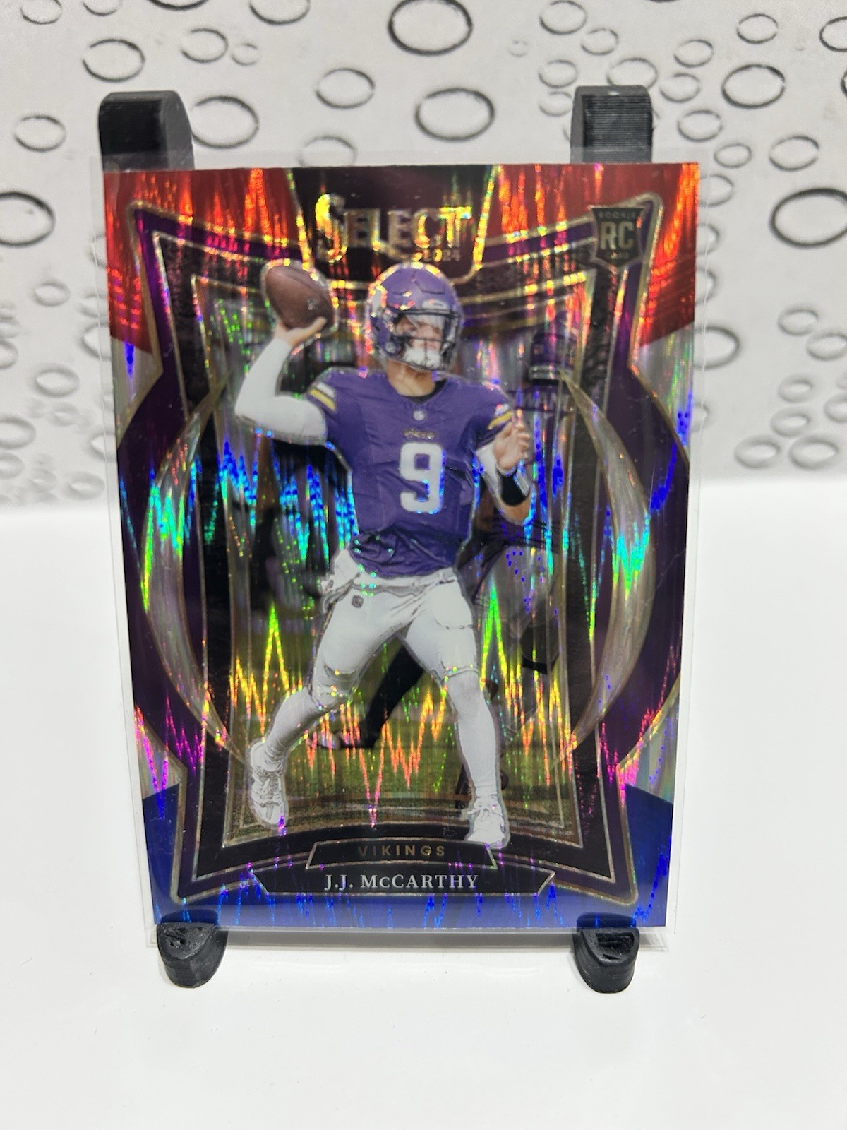 2024 Panini Select JJ McCarthy Concourse Rookie #24 Red & Blue Shock Prizm RC