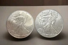 Lot of 2 American Silver Eagles  2004 & 2017 bU