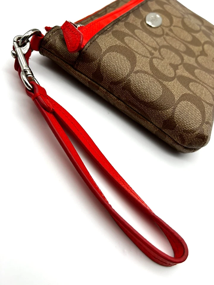 Muñequera Coach Signature Logo Pop Pouch naranja caqui para mujer Foto 4 de 4