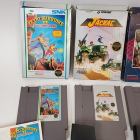 Lot of 8 NES Games Ikari Warriors II Jackal Trojan Strider Captain Comic CIB