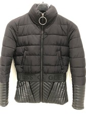 Guess. Woman’s fitted bomber puffer jacket with faux leather trim. Black. Size S
