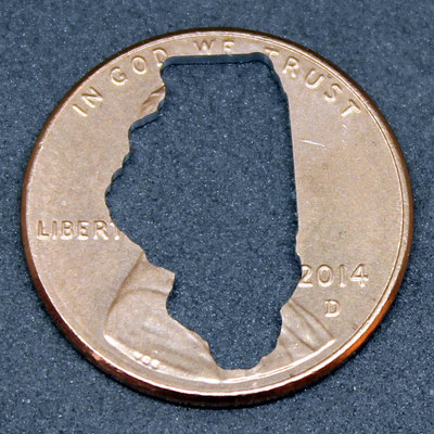 Lucky penny with Illinois cut out